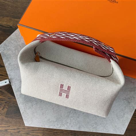 hermes bag cream|Hermes make up bag.